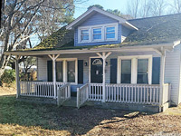 Charming Cape Cod Home on Nearly an Acre!